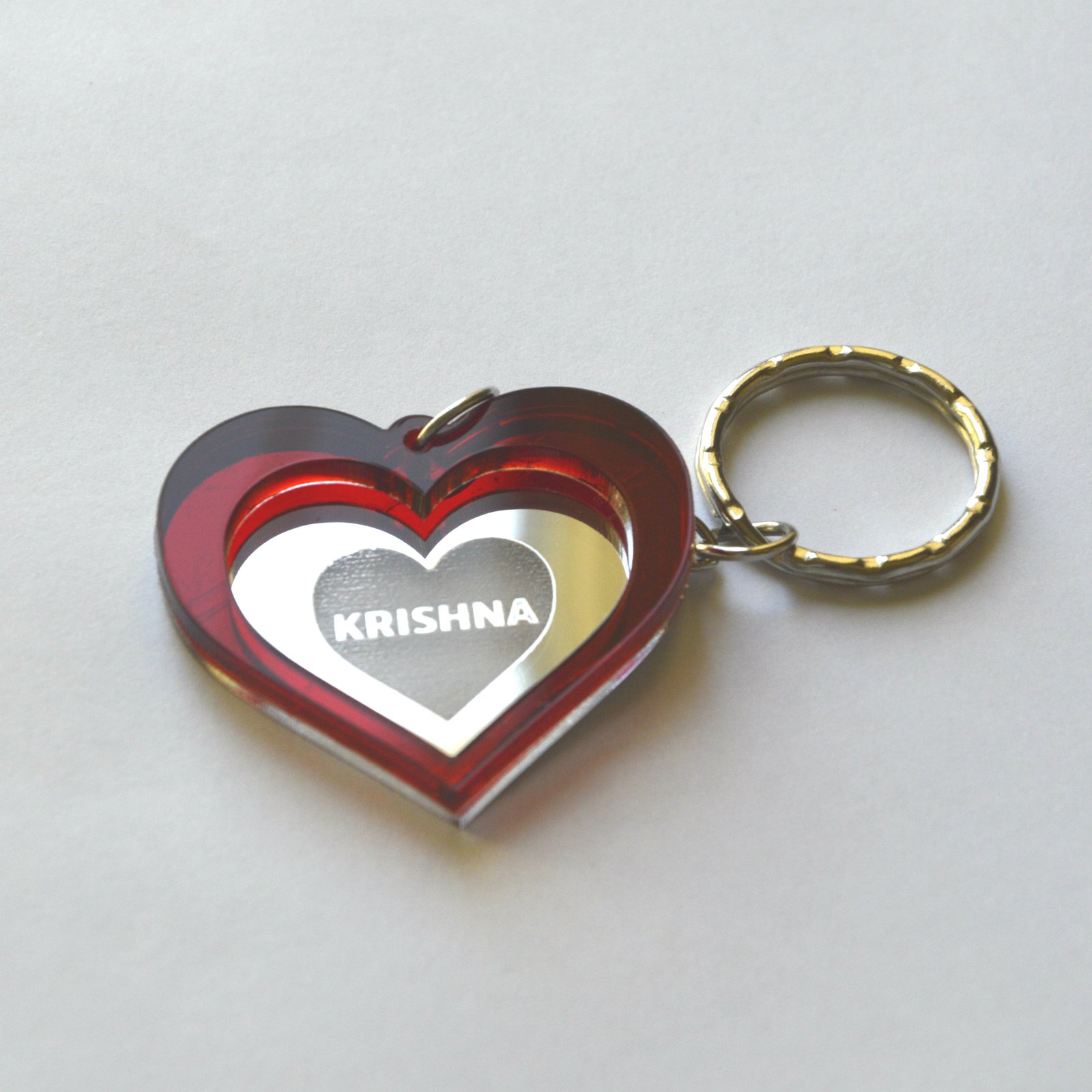 Keychain Krishna Lasercut Heart with red and mirror plastic Laser Cut