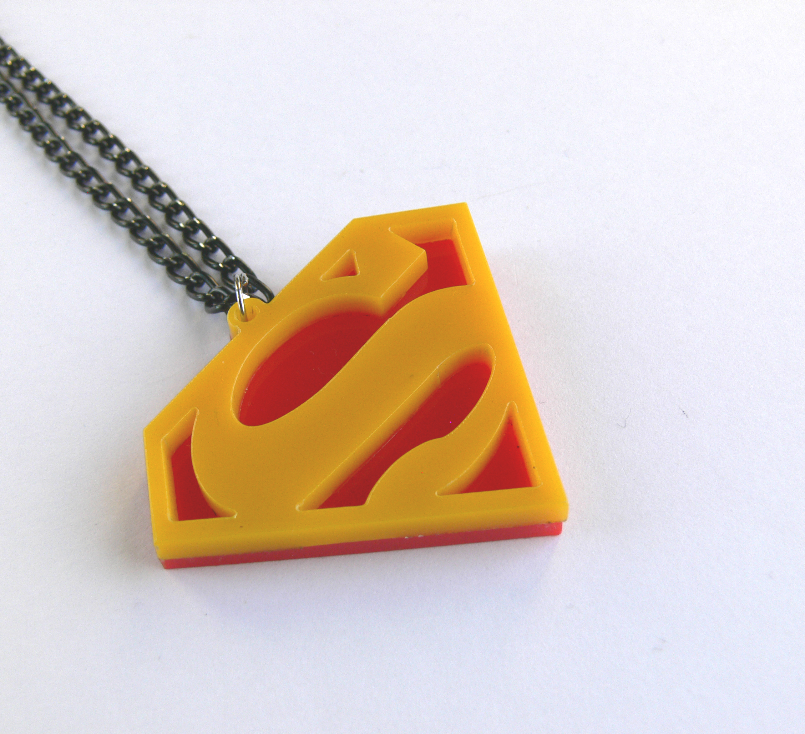 Superman necklace Laser cut red yellow plastic 2 - Laser Cut Jewelry